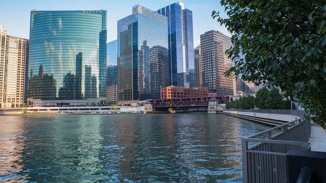 Chicago, USA - Agu 27, 2019:  The city of Chicago & the Chicago River during sunset hours