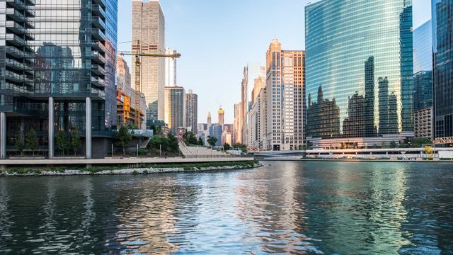 Chicago, USA - Agu 27, 2019:  The city of Chicago & the Chicago River during sunset hours