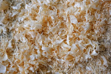 Fresh pine wood sawdust texture background