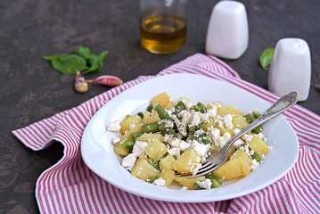 Potato Salad with Green Asparagus Beans and Feta Cheese. Harvest potatoes. Thanksgiving concept. American cuisine.