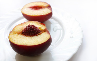 Ripe peach/.nectarine fruits isolated on white background