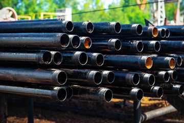 Close up drill pipe thread with pipe dope grease lay down on rig floor at oil and gas on shore...