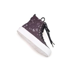 Black sneakers with abstract pattern isolated on white background