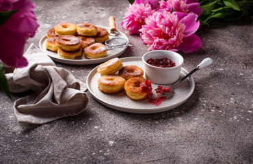 Homemade donuts with rose jam