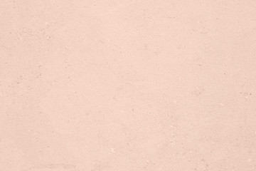 Pale pink colored low contrast Concrete textured background with roughness and irregularities