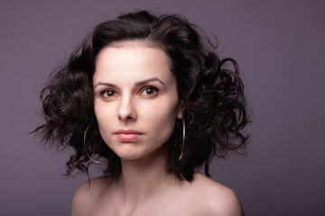 Naklejka premium beautiful young curly girl portrait