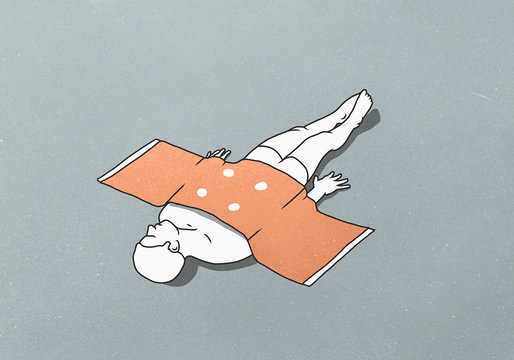 Large plaster covering male figure lying down against gray background
