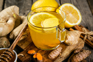 Fall immune system booster - ginger and turmeric tea and ingredients - obrazy, fototapety, plakaty