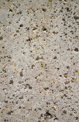 Concrete wall background with orange brown splashes.