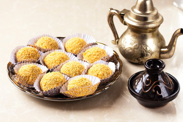 Algerian Kadaif cookies ( translated in english sweet noddles )  made with walnuts and almond,...