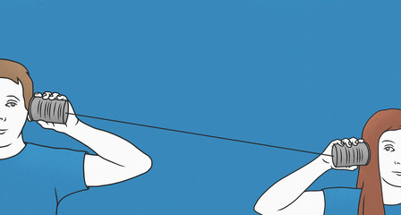 Man and woman using tin cans as telephone