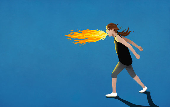 Angry girl breathing fire