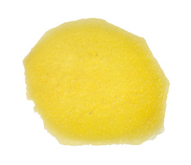 slice of ginger root lit from behind isolated