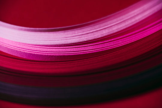 Abstract pink and red paper wave pattern