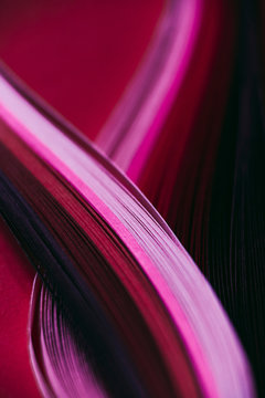 Abstract pink and red paper wave pattern