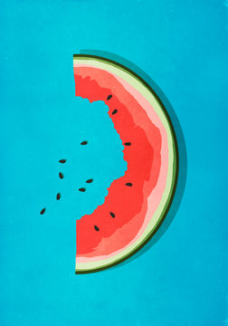 Half-eaten watermelon slice and seeds on blue background