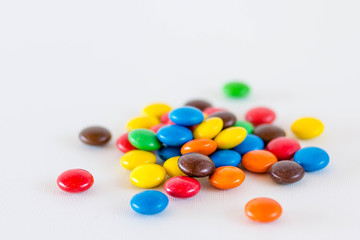 colorful candies on white background
