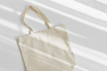 White eco bag mockup. Blank Shopping sack with copy space. Canvas tote bag. Eco friendly / Zero waste concept. - obrazy, fototapety, plakaty
