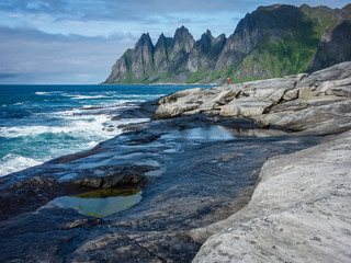 Fototapeta na wymiar The Fjords Of Norway. Rocky coast.