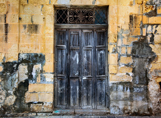 Fototapeta na wymiar Antique old destroyed rusty door