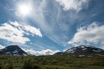 Barren nordic landscape with blue sky