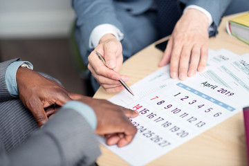 Top view of businessman proposing the next date for negotiation