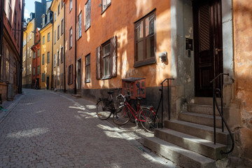 Bicycles are in a narrow street
