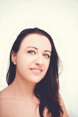 Fototapeta premium A portrait of beautiful face with beautiful eyes - isolated on white.