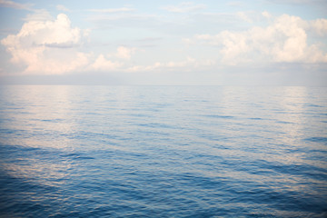 Obraz premium Blue abstract background. Calm sea water surface background.