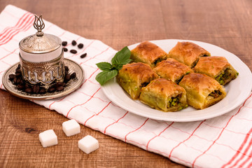 Turkish delights - baklava traditional sweets with turkish coffee, sugar and coffee beans