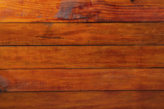 Brown wood table background, lots of contrast, wooden texture