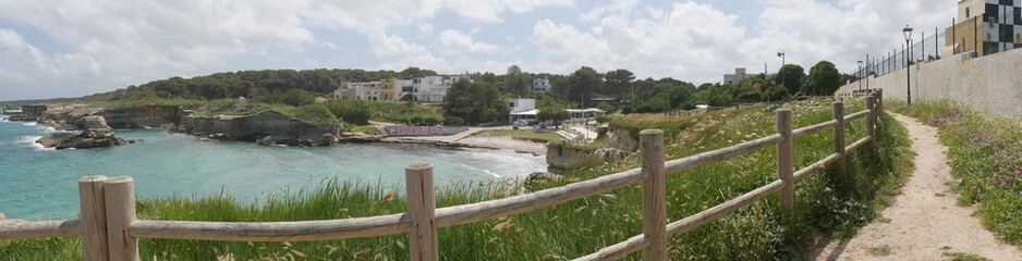 Lighthouse owned by the Navy and touistic village of Torre Sant'Andrea in Salento.