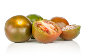 Group of three whole two halves of fresh greenish red tomato isolated on white background