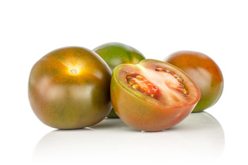 Group of three whole one half of fresh greenish red tomato isolated on white background