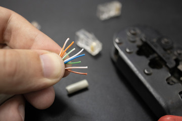 making crimp for ethernet network rj45 wire with crimping tool. step by step process.