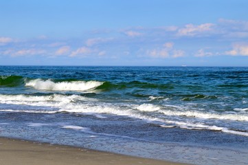 Blue wavy sea and sky