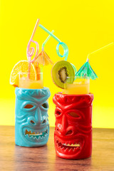 Hawaiian tiki bar, summer refreshing drinks and tropical cocktails concept theme with glasses of...