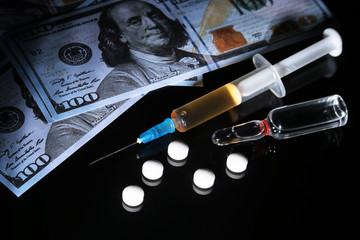 drug trafficking, crime, addiction and sale concept - closeup of with drugs and money.