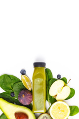 Vegetable smoothie in composition with raw vegetables and green fruits. Healthy eating concept