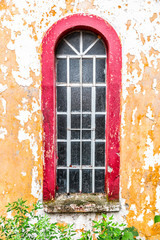 Tall, arch shaped ancient window