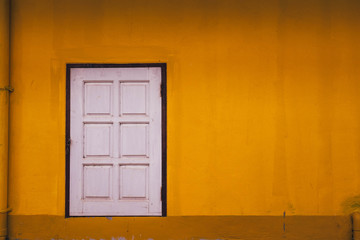 old wooden door in the wall