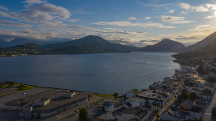 Orsta Norway cityscape. Panoramic aerial view from drone at sunset in july 2019