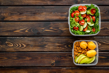 meal in lunch box to take away on wooden background top view mockup