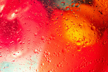 abstract space background. Water drops of different colours.