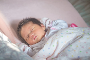 sleeping newborn baby