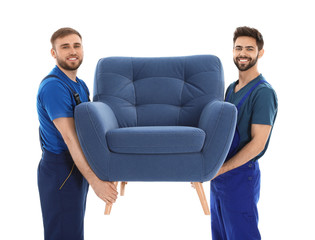Young workers carrying armchair isolated on white. Moving service