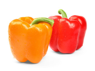 Wet ripe bell peppers on white background