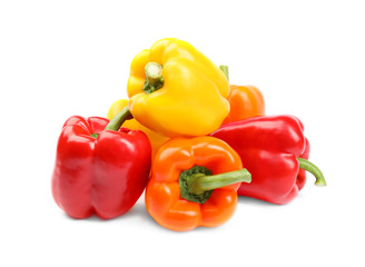 Fresh ripe bell peppers on white background