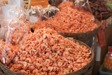 Dried shrimp. dried shrimp prepared for cooking in thailand market. Dried shrimp or dried salted prawn background, seafood background. piled of shrimp sell at market.
