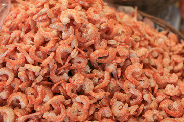 Dried shrimp. dried shrimp prepared for cooking in thailand market. Dried shrimp or dried salted prawn background, seafood background. piled of shrimp sell at market.